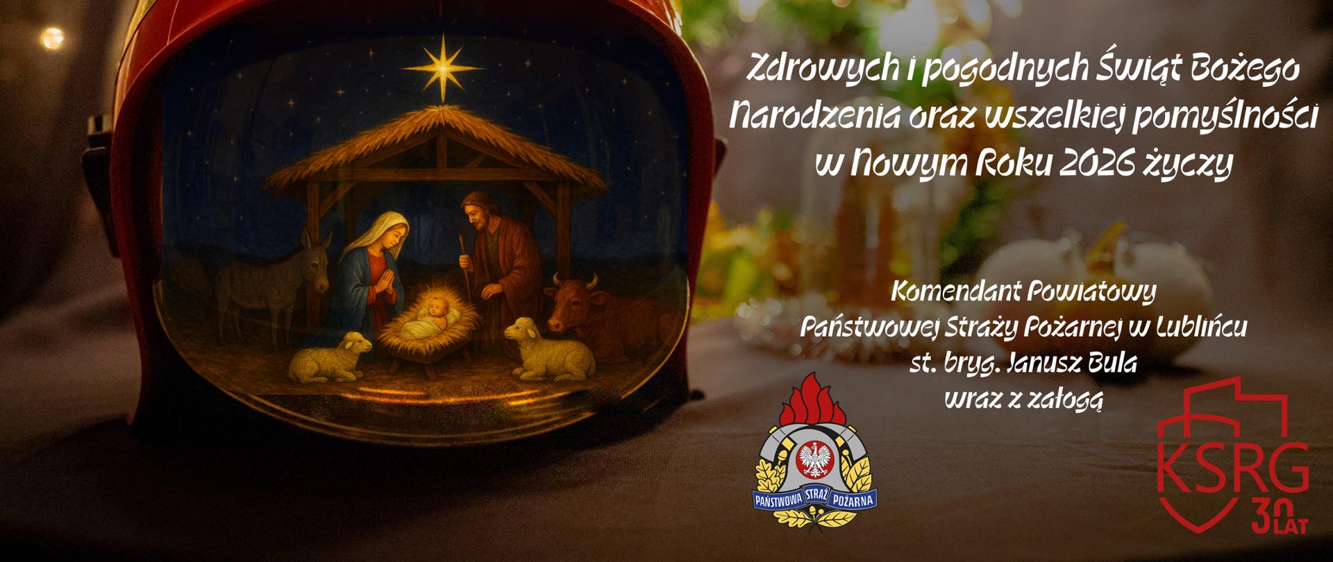 Na zdjęciu tekst życzeń, obok hełm strażacki z grafiką stajenki świątecznej