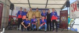 Zwycięska sztafeta w kategorii OPEN na podium - reprezentacja KW PSP Poznań