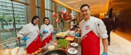 Hotel staff in Polish aprons