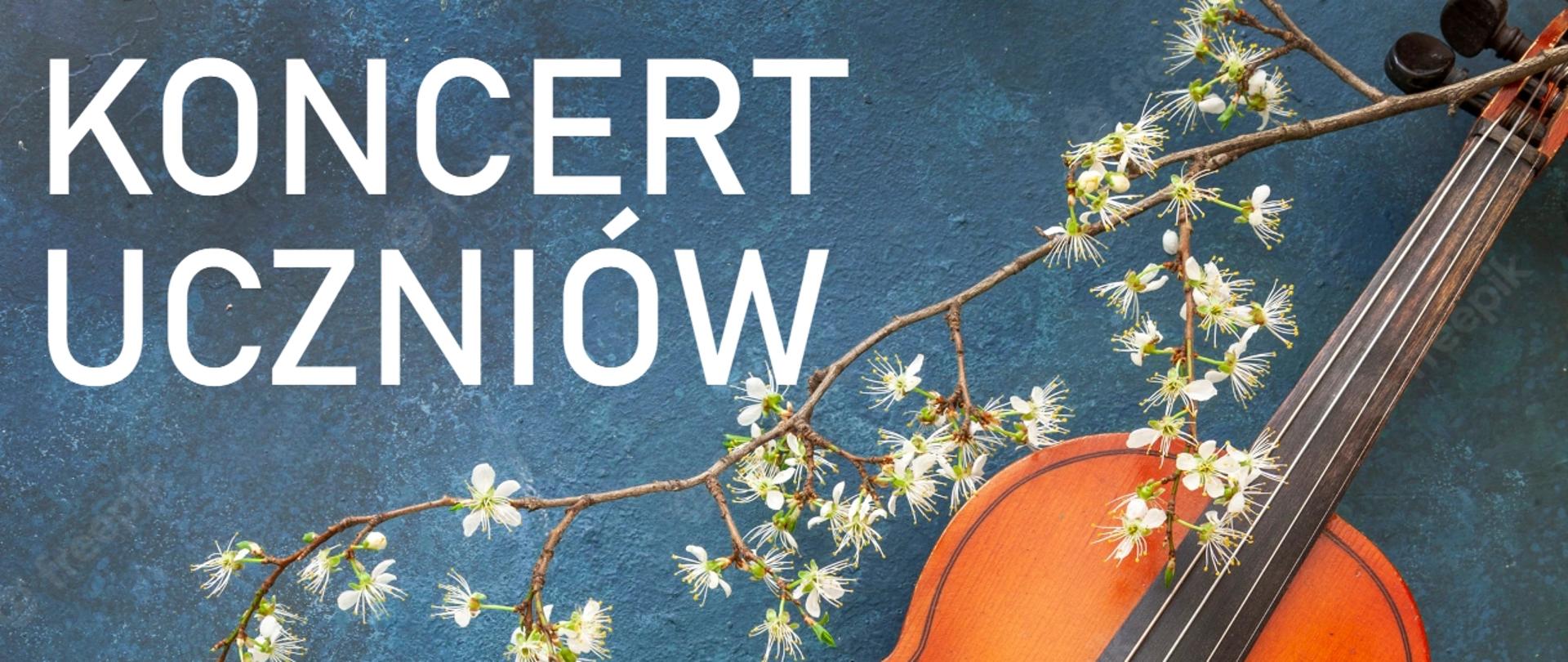 Zdjęcie przedstawiające skrzypce i flet na granatowym tle z widoczną u góry gałązką drzewa. W prawym dolnym rogu logo szkoły. Napisy w białym kolorze o treści: Koncert uczniów klasy fletu mgr Moniki Kobayashi oraz klasy skrzypiec mgr Tadeusza Wachowskiego - w repertuarze duety skrzypcowe. Koncert odbędzie się w dniu 08.12.2022 r. o godz. 17.00 w auli szkoły.