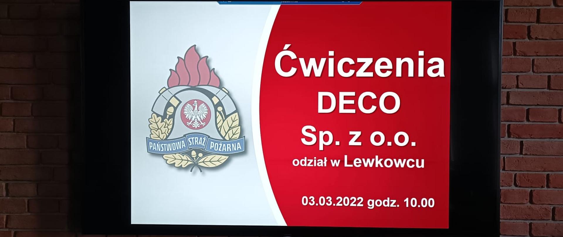 na scianie wisi telewizor na który jest wyswietlony napis ćwczenia deco sp. z o.o. oddziałw w Lewkowcu 03.03.2022 godz. 10:00