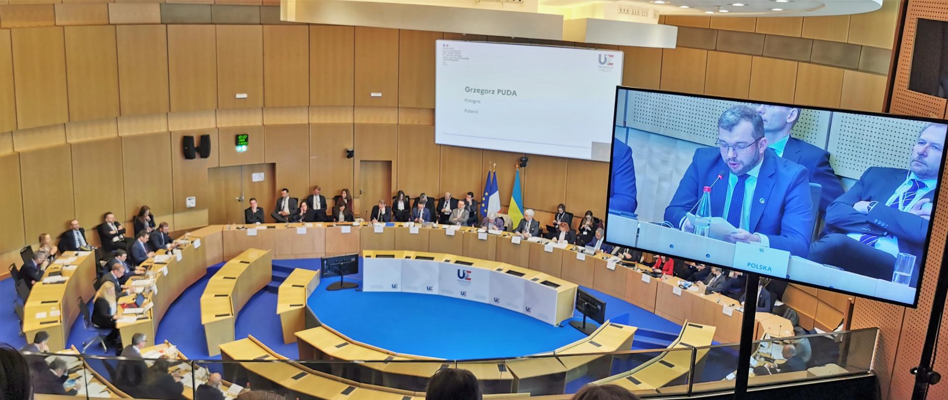 Minister Grzegorz Puda podczas wystąpienia na spotkaniu ministrów europejskich odpowiedzialnych za politykę spójności 