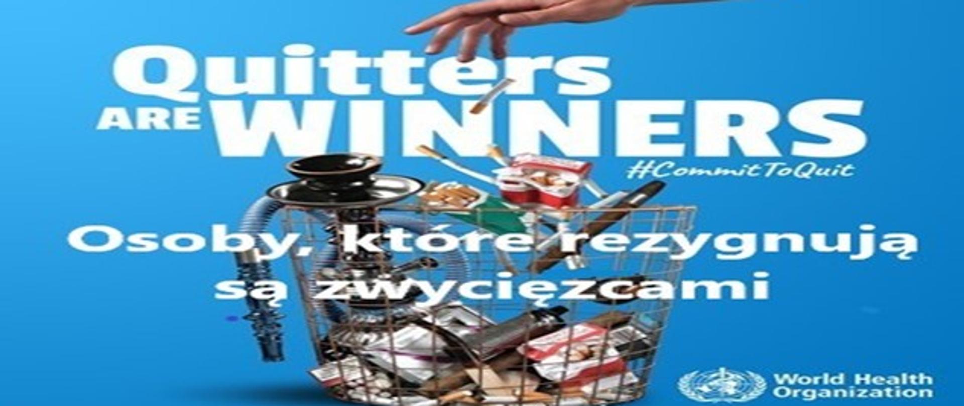 W koszyku znajdują się rożne przyrządy do palenia tytoniu i e-papierosy. Od góry ręka wyrzuca papierosy. Od góry widnieje napis po angielsku Quitters are WINNERS. Poniżej polski napis :Osoby, które rezygnują są zwycięzcami.