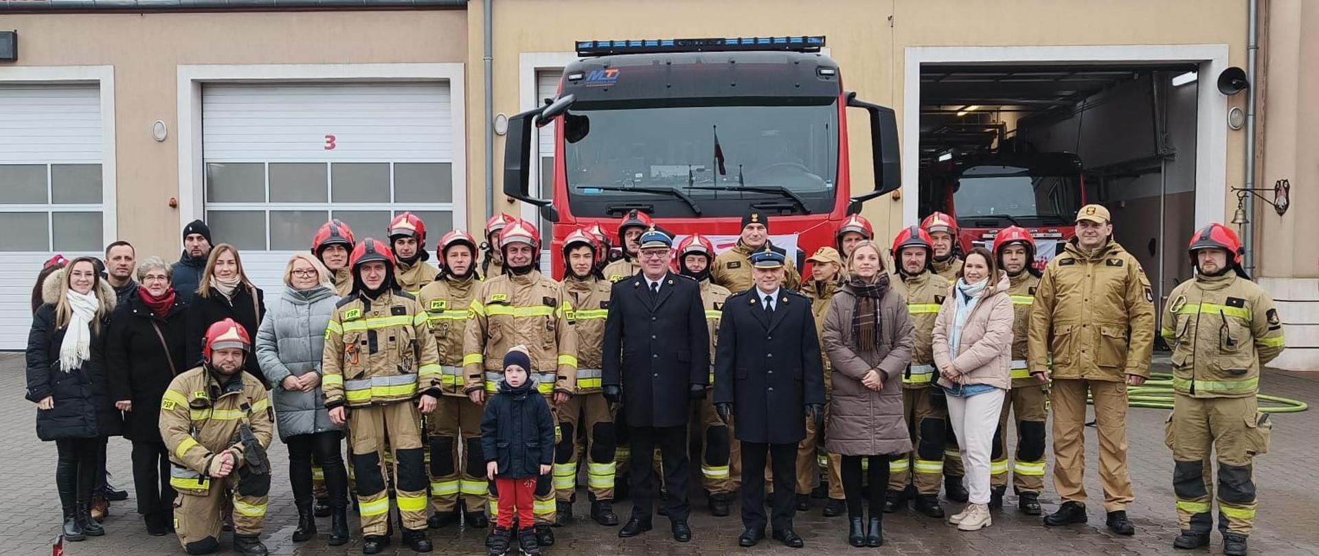 Pożegnanie w KP PSP w Szczytnie st. ogn. Krzysztofa Więcka z uwagi na przejście na zaopatrzenie emerytalne i przeniesienie asp. Adriana Kowalskiego. 