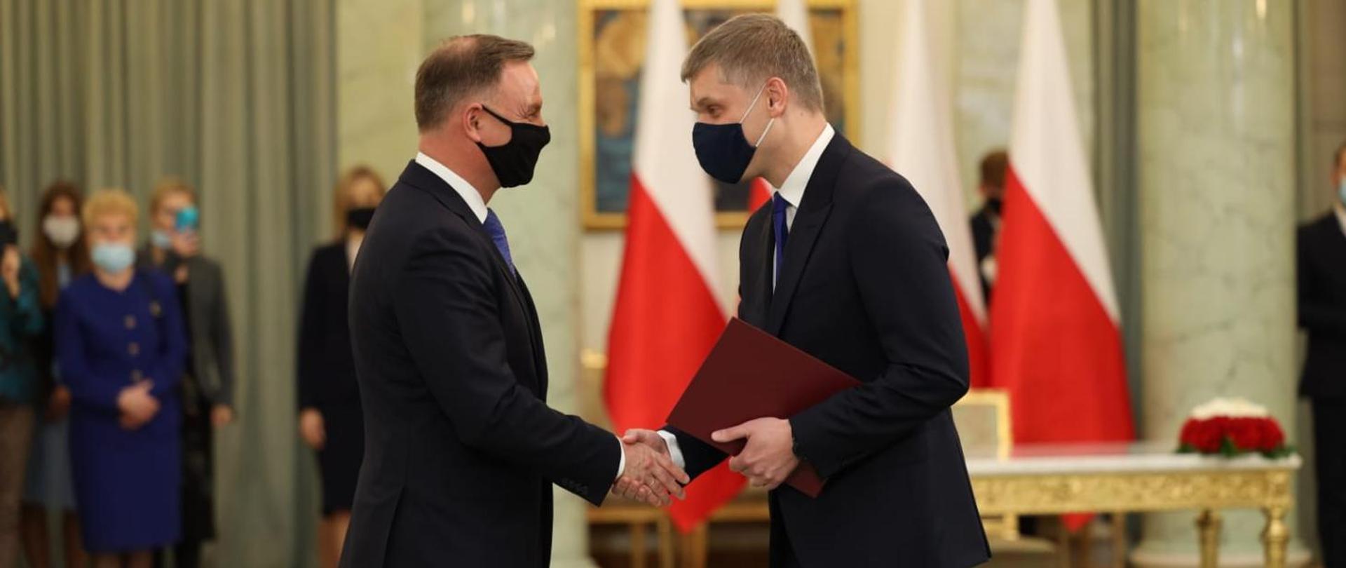 President of the Republic of Poland Andrzej Duda congratulates Piotr Nowak on his nomination as Minister of Development and Technology