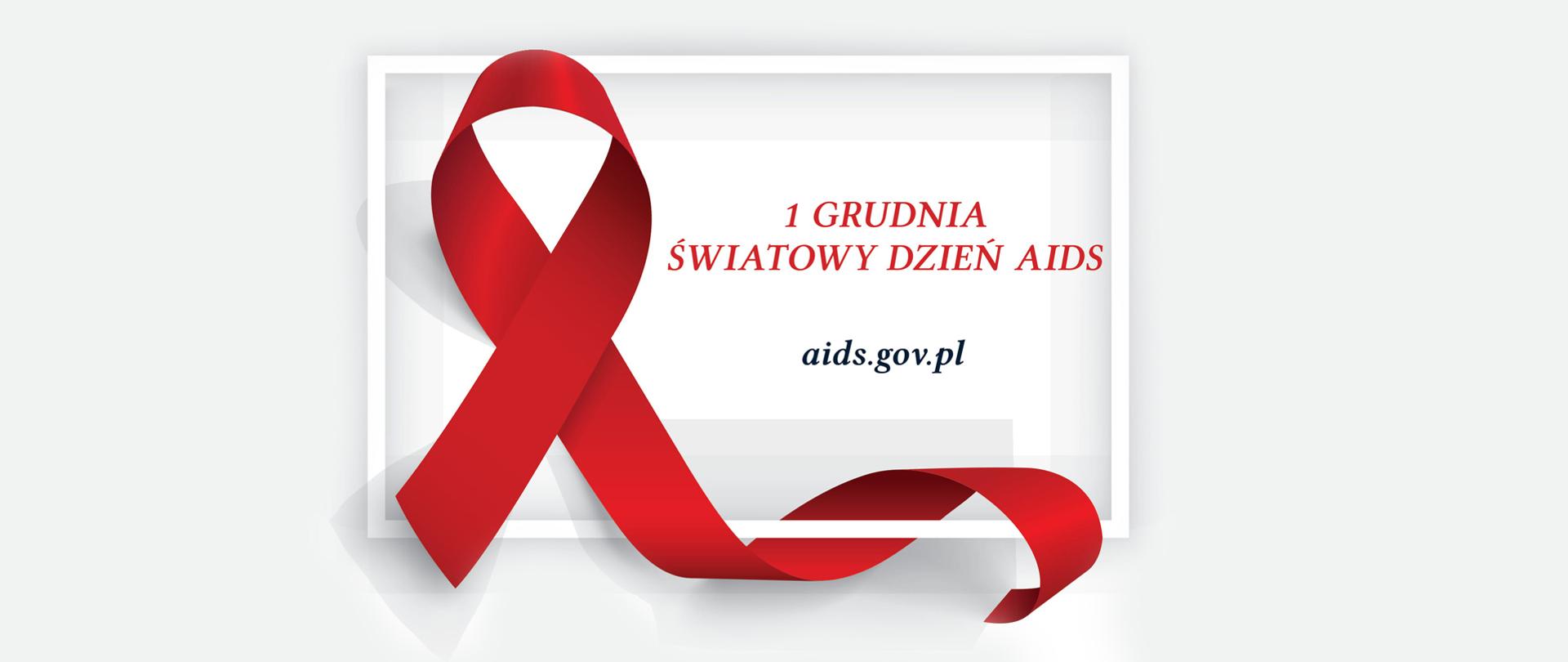 „Czerwona kokardka” - symbol solidarności z osobami żyjącymi z HIV i AIDS. Napis: 1 grudnia Światowy Dzień AIDS, aids.gov.pl