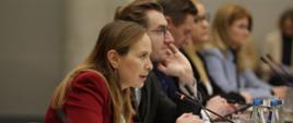 In the photo, Minister Katarzyna Pełczyńska-Nałęcz sits at the conference table