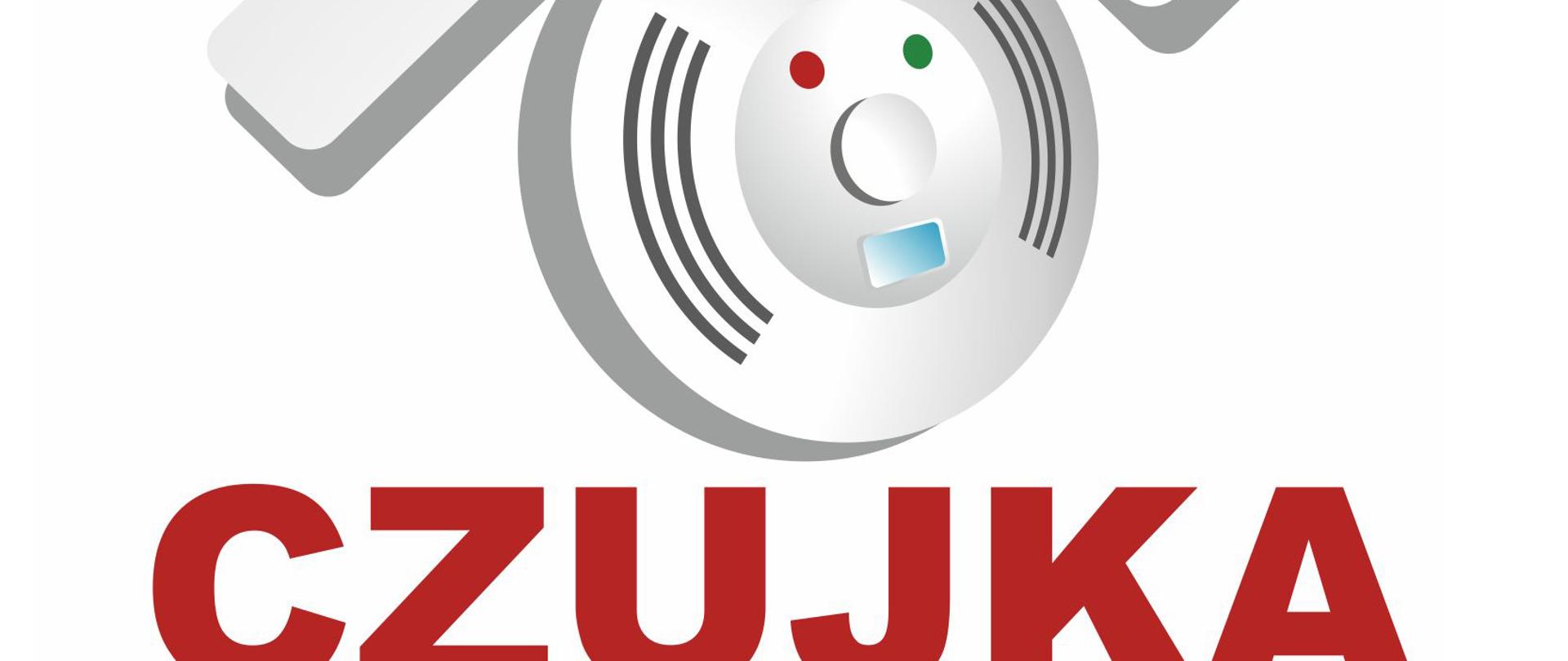 Logo kampanii czujka na straży Twojego bezpieczeństwa. Czerwony napis czujka na straży twojego bezpieczeństwa na białym tle. Nad napisem znajduje się grafika czujki dymu nad czujką daszek.
