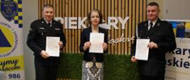 Zdjęcie przedstawia Komendanta Miejskiego Państwowej Straży Pożarnej w Piekarach Śląskich, Panią Prezydent Miasta Piekary Śląskie oraz przedstawicieli jednostek ochotniczych straży pożarnych
