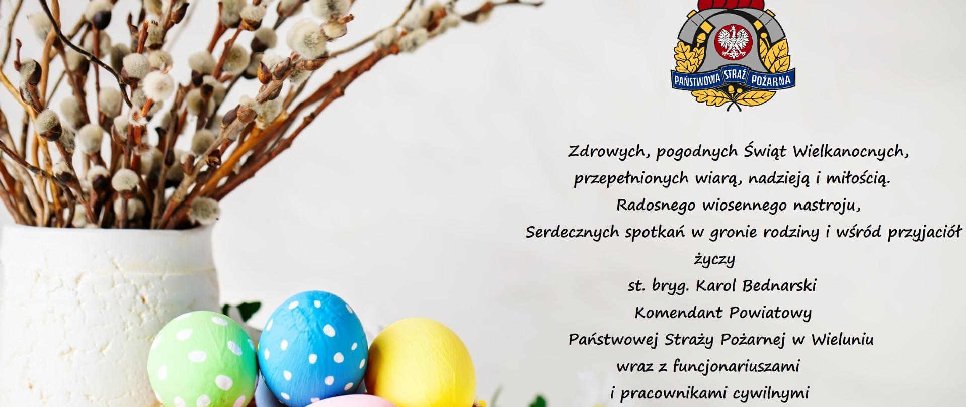 Happy Easter. Congratulatory easter background. Easter eggs and flowers. Background with copy space. Selective focus. Horizontal.