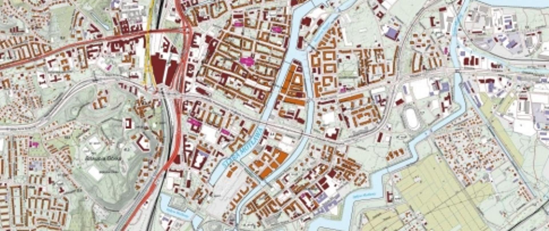 Ilustracja przedstawia zrzut ekranu z przykładową wizualizacją kartograficzną BDOT10k w skali 1:10 000 dla Gdańska.