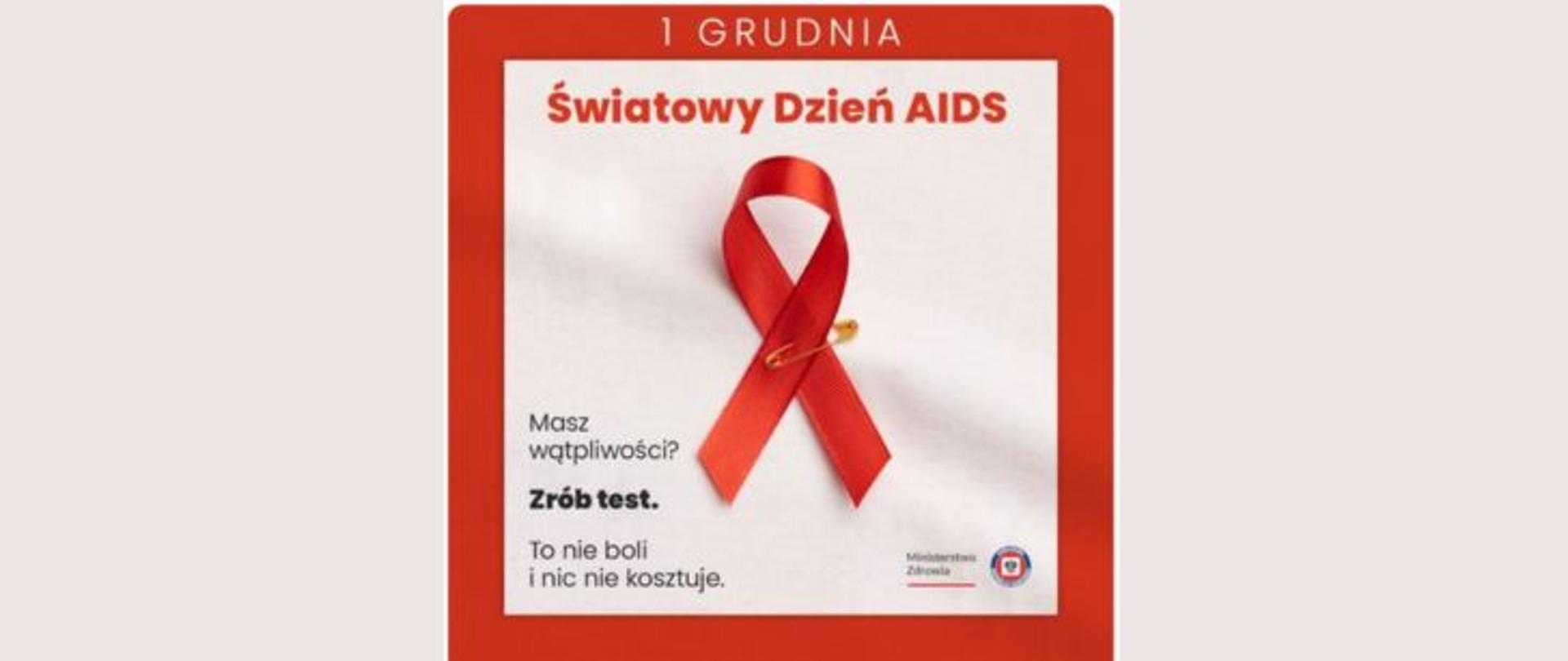 Na beżowym tle w czerwonej ramce czerwona wstążka przypięta agrafką, powyżej jasny napis 1 grudnia oraz czerwony napis Światowy Dzień AIDS, poniżej po lewej ciemny napis Masz wątpliwości? Zrób test. To nie boli i nic nie kosztuje. W prawym dolnym rogu w ramce logo Państwowej Inspekcji Sanitarnej oraz Ministerstwa Zdrowia.