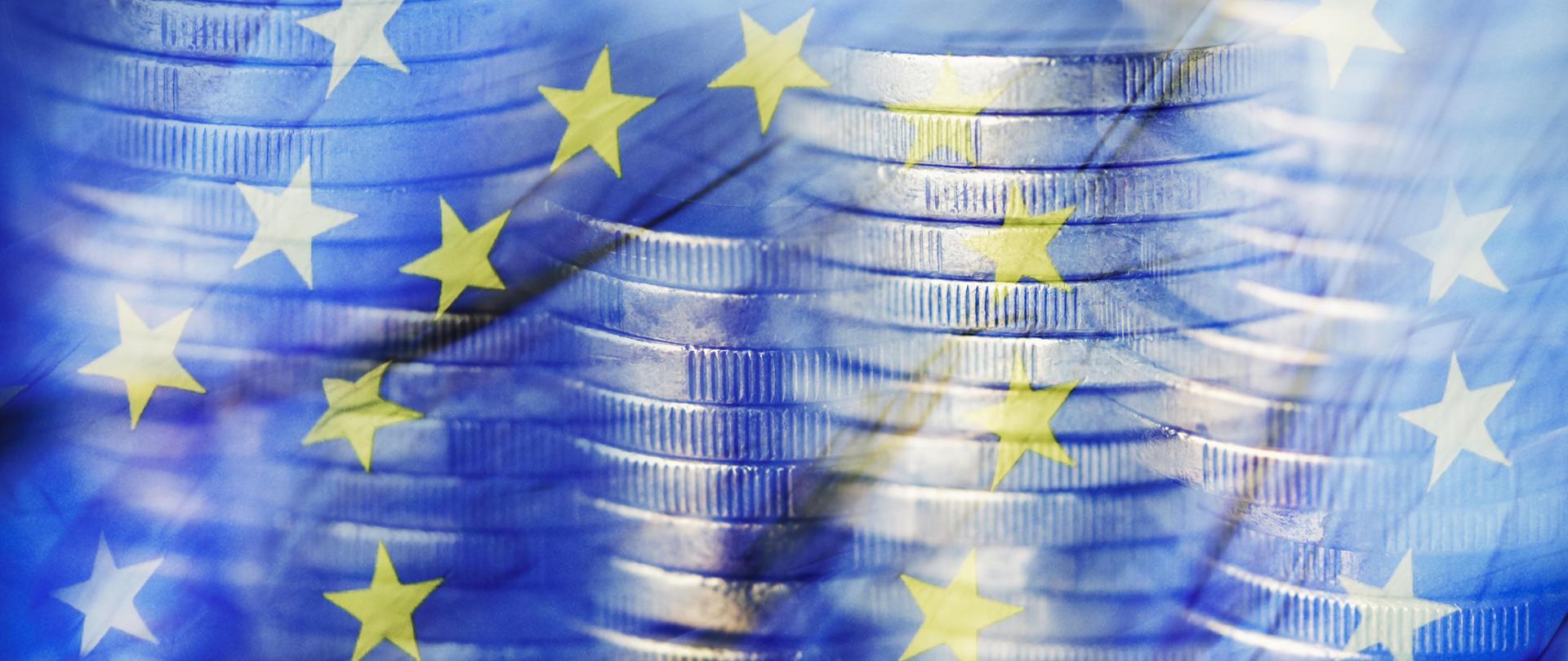 Żółte gwiazdy na niebieskim tle oraz monet