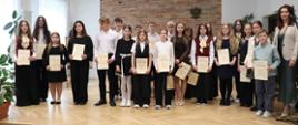 Fotografie z koncertu laureatów Miechowskiego Festiwalu Młodych Muzyków 2026 przedstawiają występy młodych artystów oraz uroczyste wręczenie dyplomów i nagród