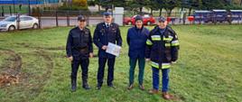 st. bryg. Jarosław Tomczyk, st. bryg. Mirosław Pender, dh Prezes Andrzej Stolarski oraz dh Roman Gadomski ziemi gminy Biesiekierz - Stare Bielice
