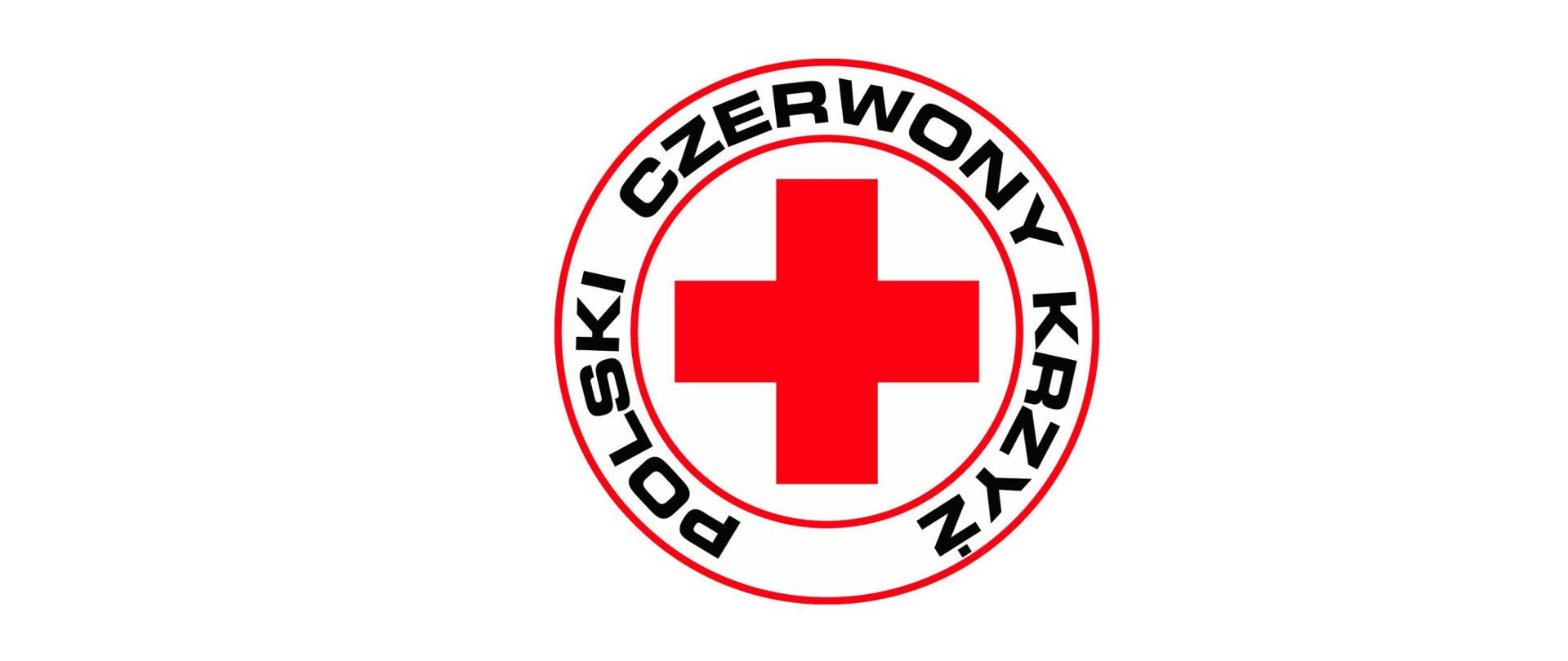 Logo Polskiego Czerwonego Krzyża. Napis Polski Czerwony Krzyż w kole i czerwony krzyż.