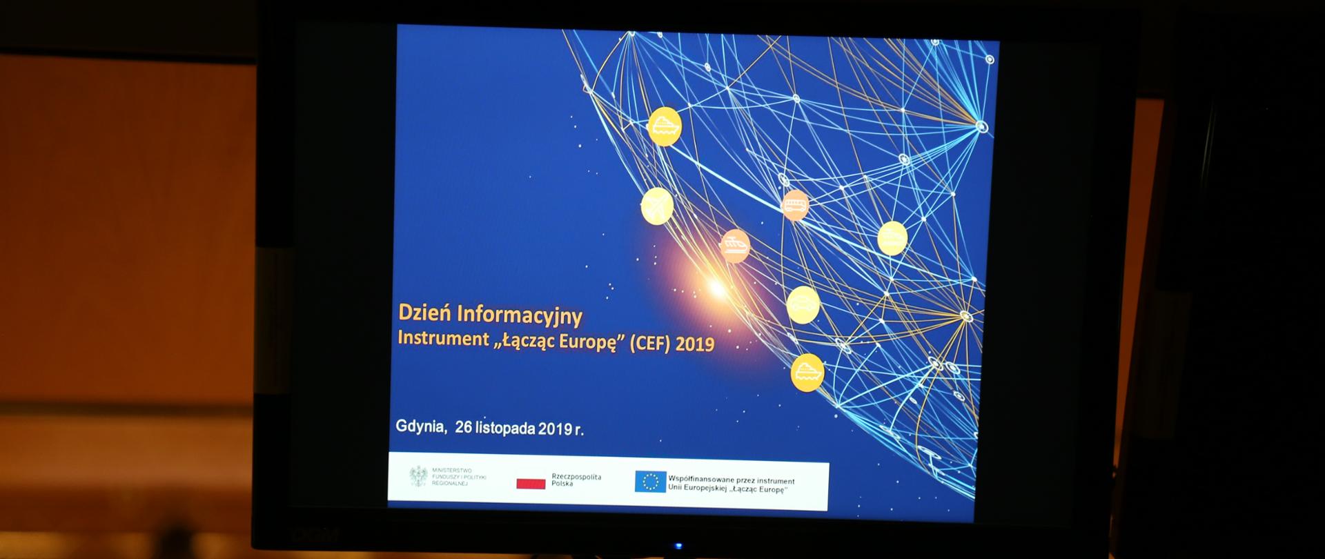Zdjęcie. Ekran, na którym jest napis "Dzień Informacyjny Instrument "Łącząc Europę CEF, 2019, Gdynia, 26 listopada 2019 r. 