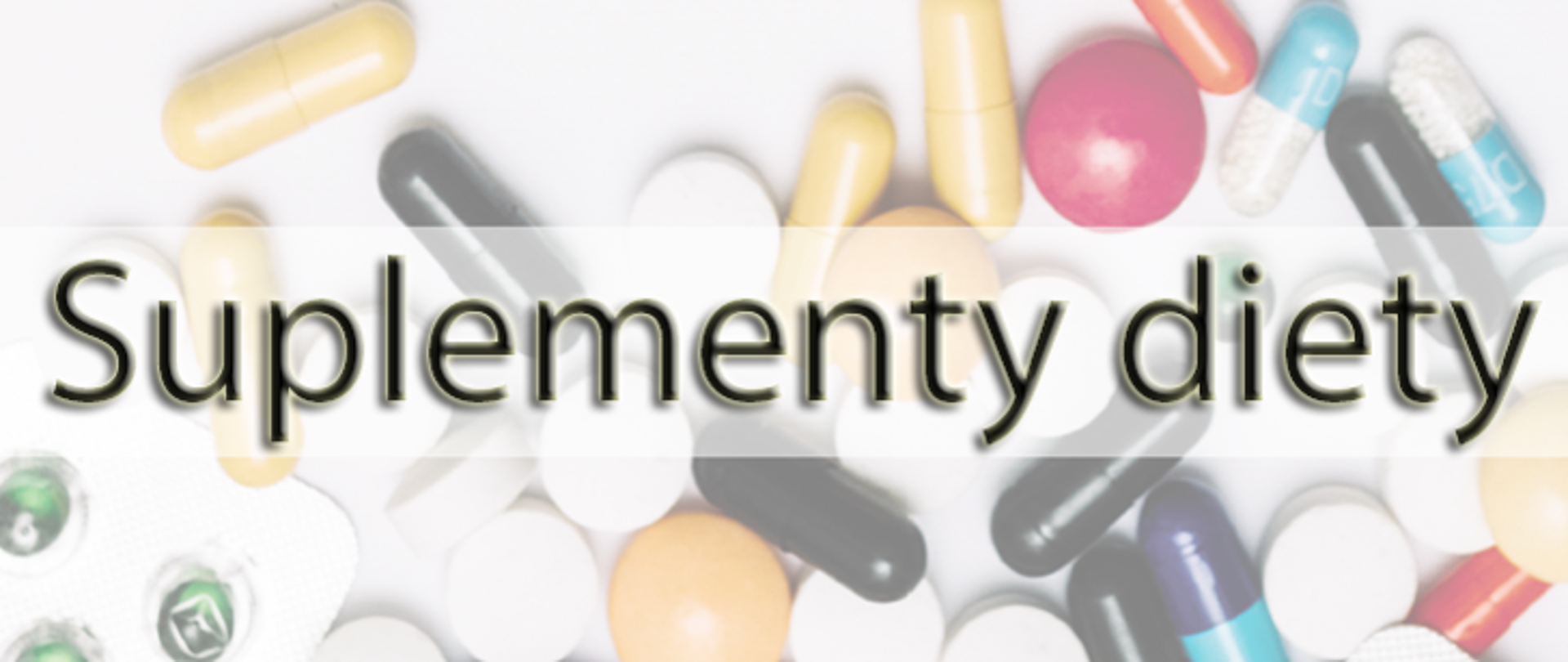 Różne tabletki z suplementami, napis Suplementy diety