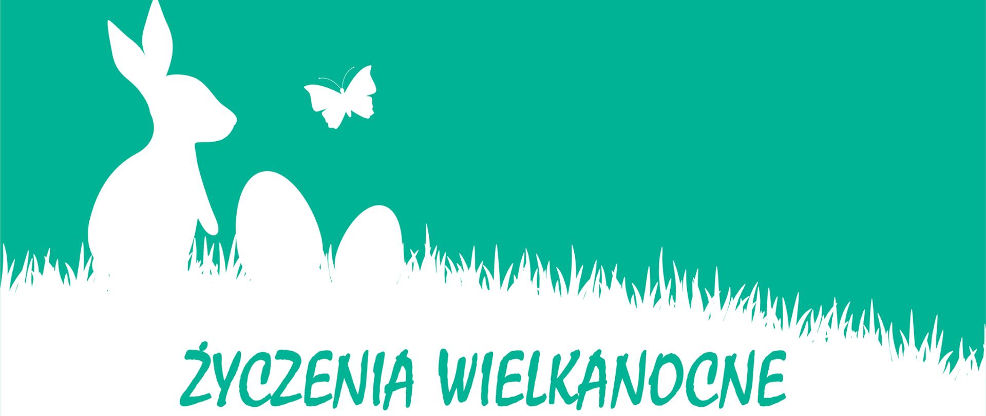 Kartka przedstawiająca królika z jajkami wielkanocnymi.
