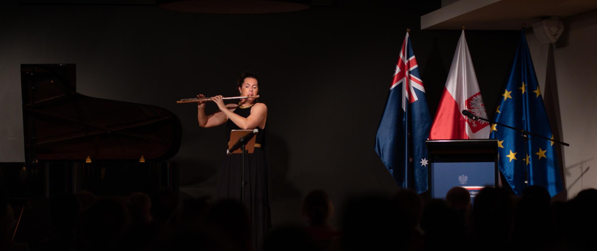 Concert at the Consulate General of the Republic of Poland in Sydney to commemorate the 85th Anniversary of the Siege of Tobruk artist on the stage.