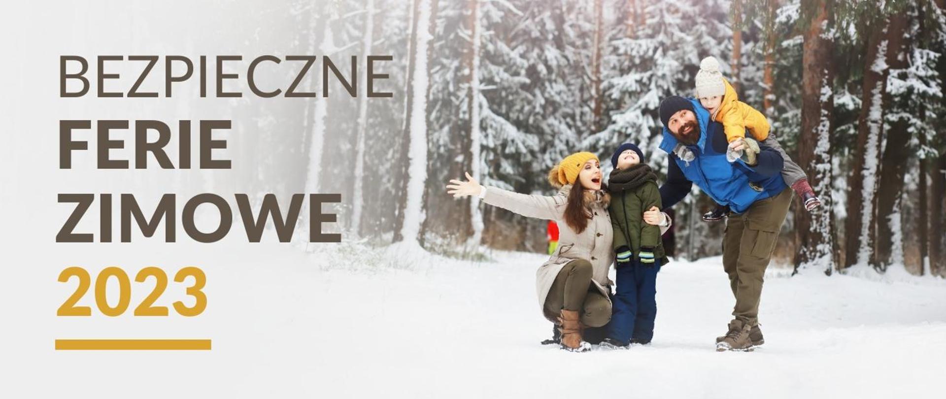 Grafika - zdjęcie ośnieżonego lasu, na pierwszym planie rodzina z dwójką dzieci i napis Bezpieczne ferie zimowe 2023