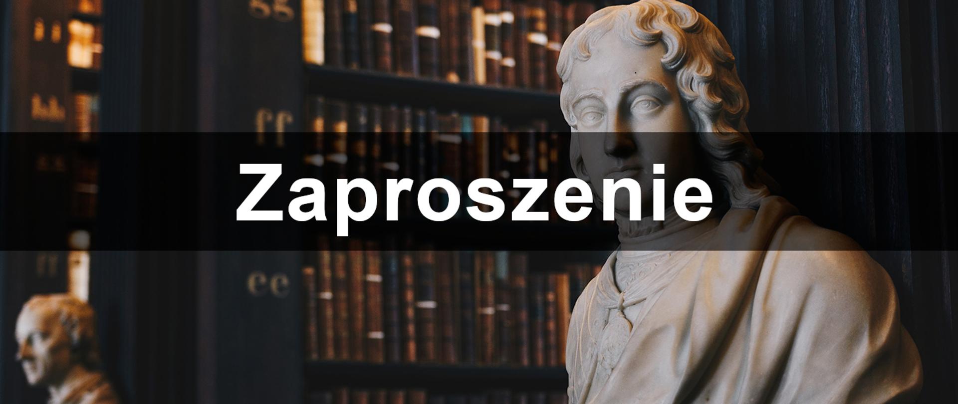 Baner książki i posąg