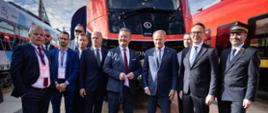 Premier Donald Tusk i minister infrastruktury Dariusz Klimczak na targach kolejowych TRAKO