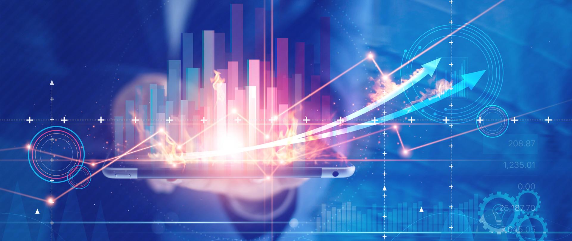 Dłoń z tabletem, płonący wykres, słupki, strzałki.