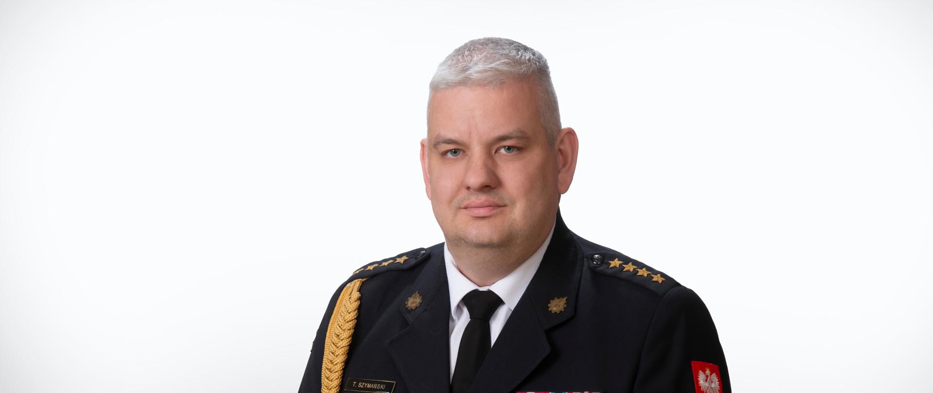 Zdjęcie przedstawia Zastępcę Komendanta Miejskiego Państwowej Straży Pożarnej w Zabrzu st. kpt. Tomasza Szymańskiego.