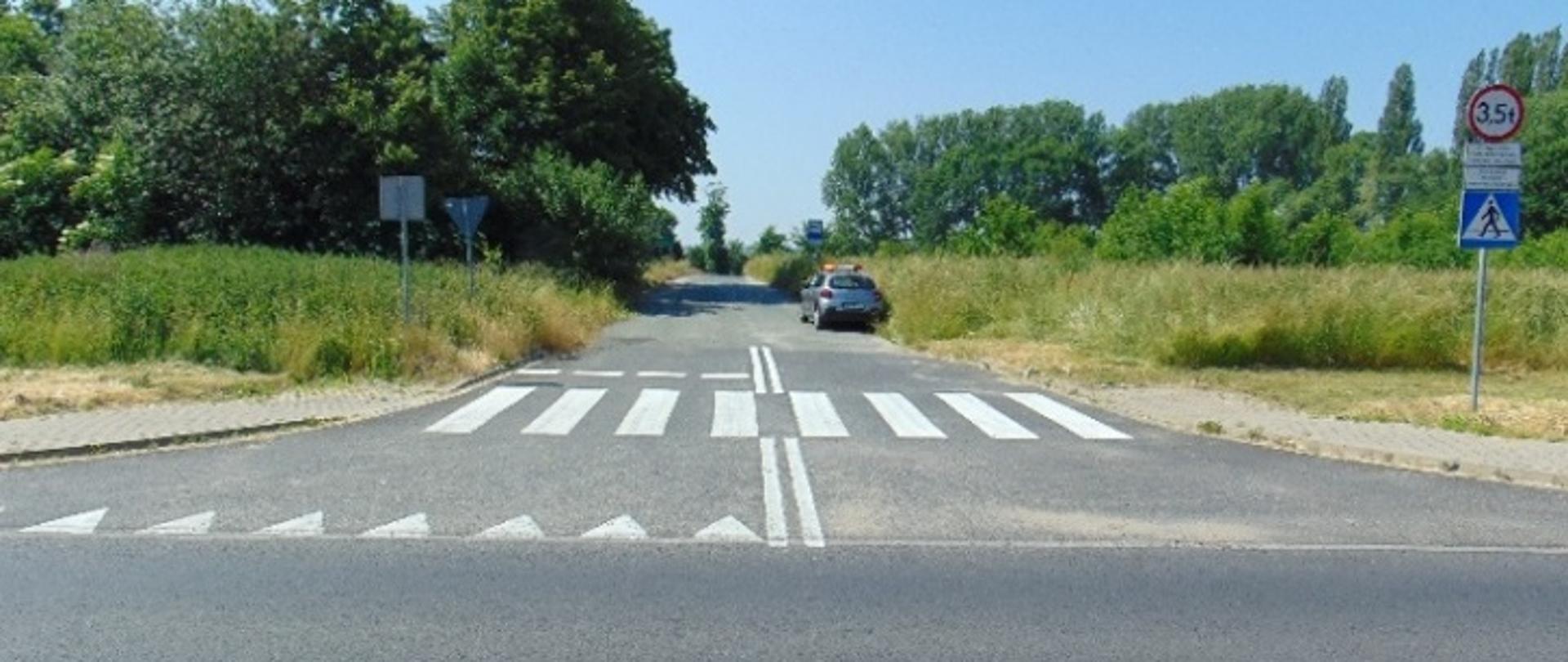 DK 39 z drogą gminną po stronie prawej w m. Piotrowice km 12,321