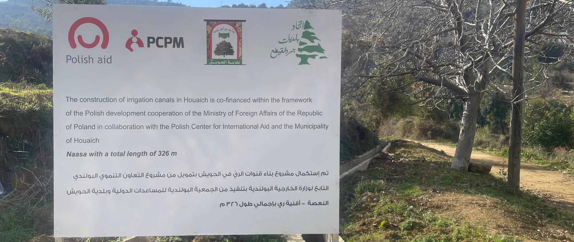 Tablica przy kanale irygacyjnym w Hweish