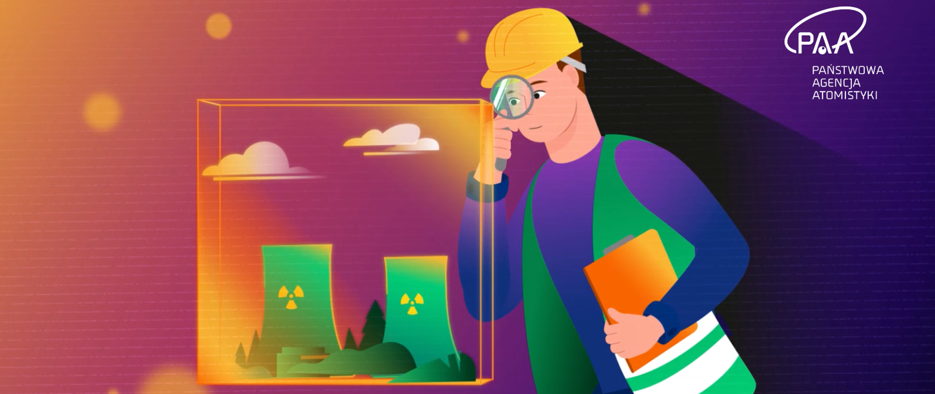 Grafika - inspektor dozoru jądrowego z kaskiem ochronnym na głowie oraz kamizelką ogląda przez lupę symboliczną wizualizację elektrowni jądrowej, zamkniętej w sześcianie. W drugiej ręce inspektora znajduje się notatnik