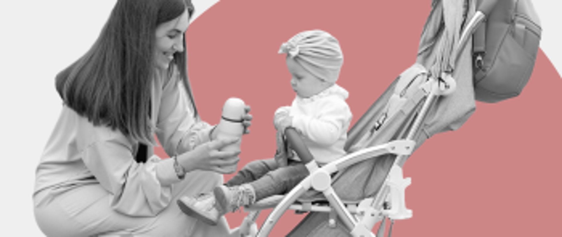 Zdjęcie przedstawia kobietę i dziecko w wózku. 