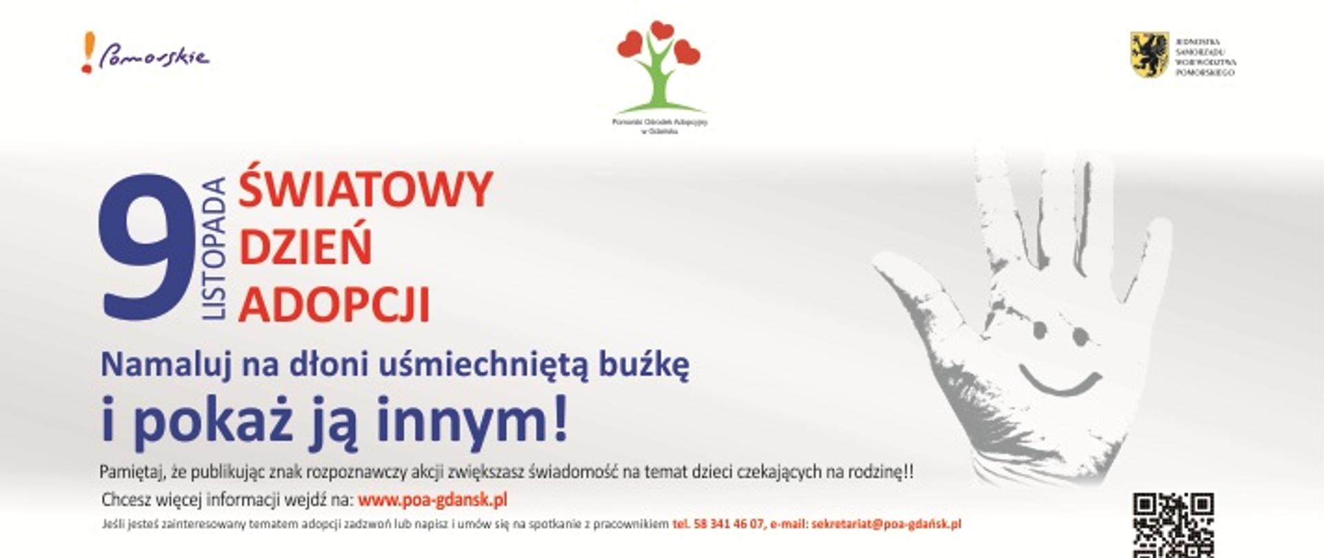 grafika z rysunkiem dłoni i uśmiechniętą buzią i napisem Światowy Dzień Adopcji