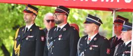 Na zdjęciu widać Warmińsko - Mazurskiego Komendanta Wojewódzkiego PSP, Starostę powiatu Oleckiego oraz pozostałych gości.