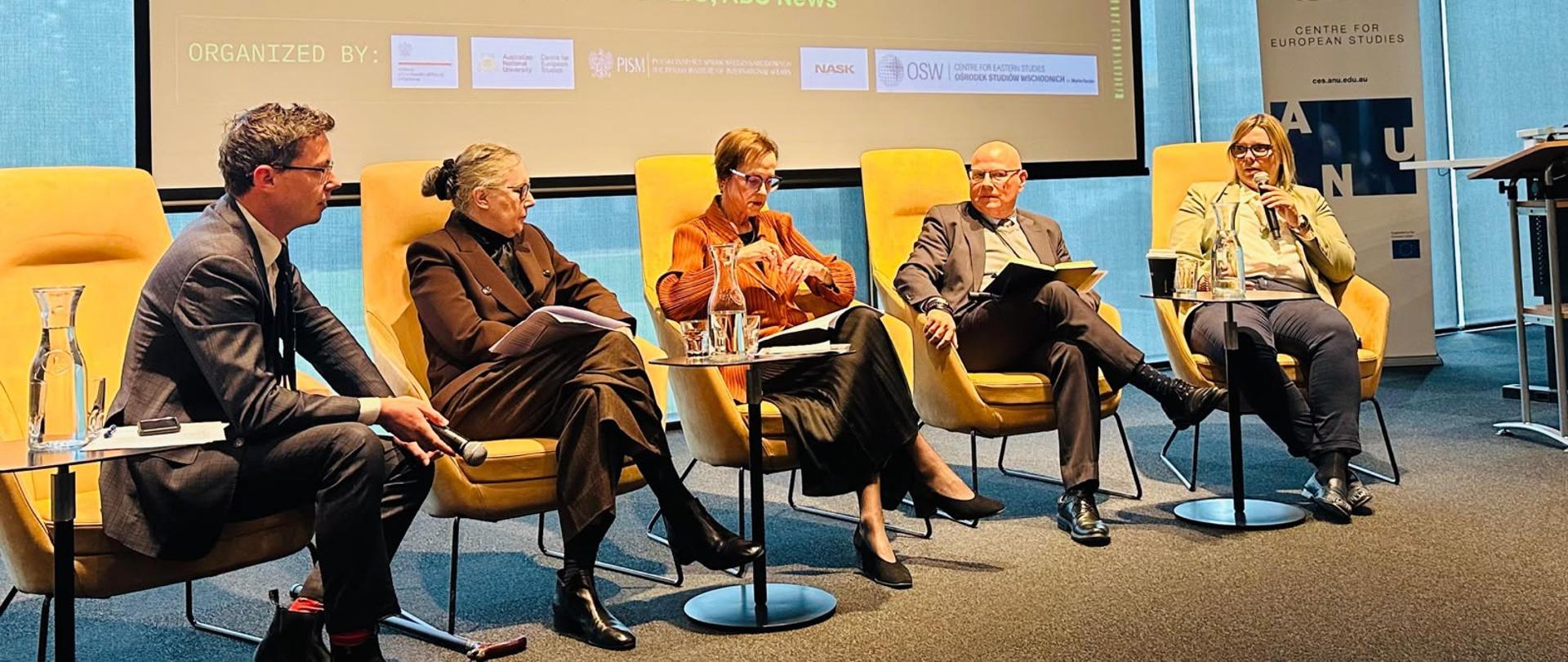 Group of speakers during a conference