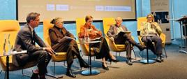 Group of speakers during a conference
