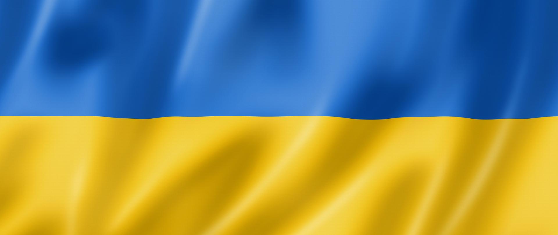 Flaga Ukrainy – prostokąt podzielony na dwa poziome pasy: niebieski i żółty.