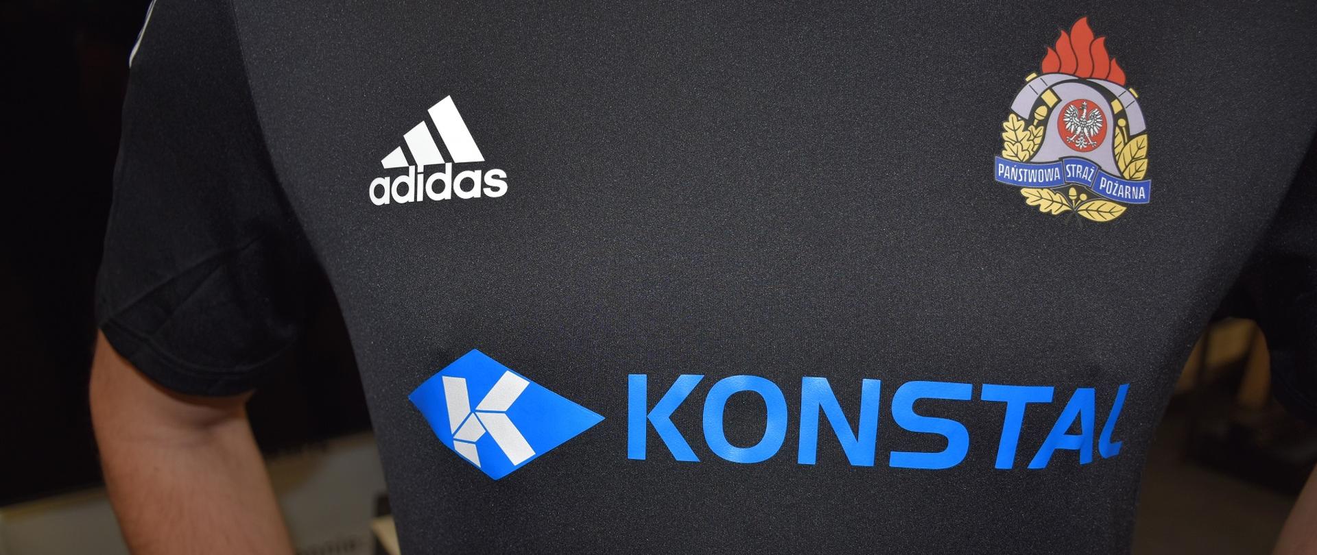 Koszulka sportowa z nadrukiem loga PSP oraz sponsora