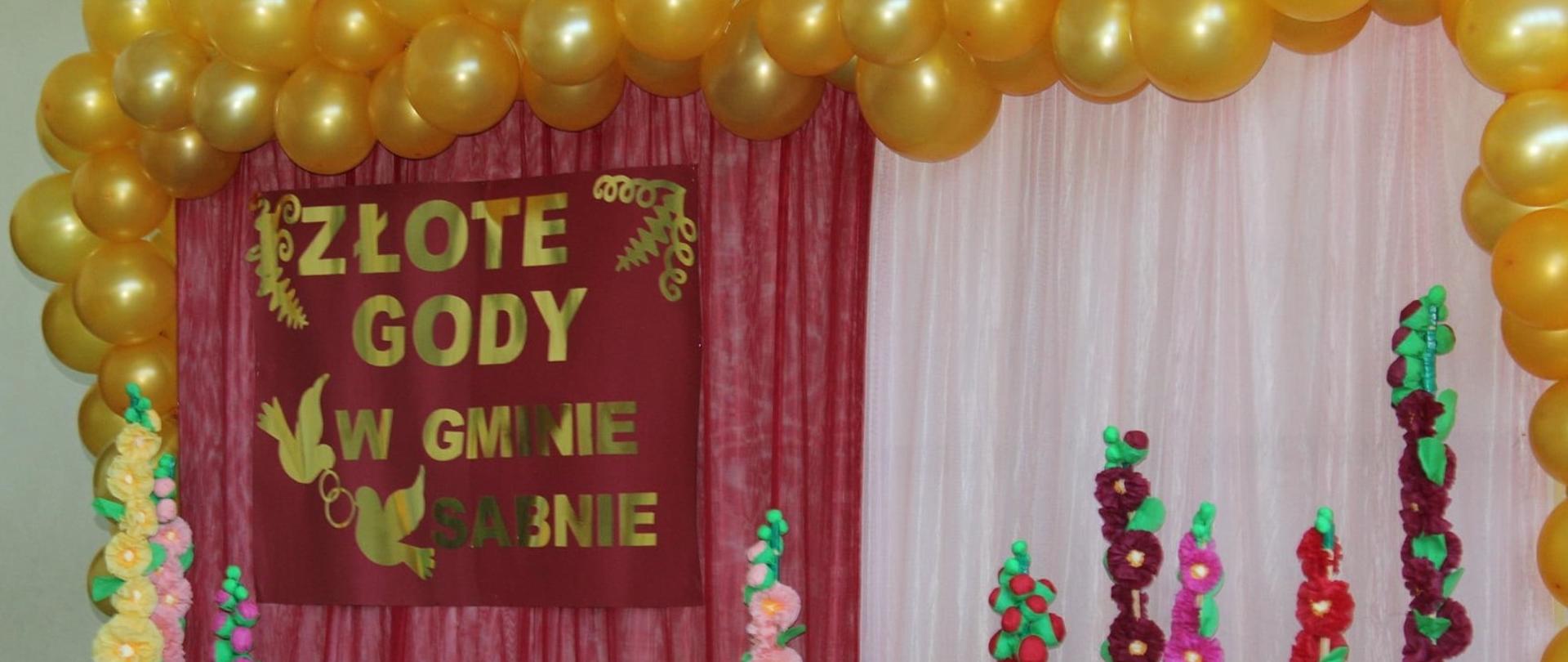 Na zdjęciu znajduje się napis "Złote gody w Gminie Sabnie"