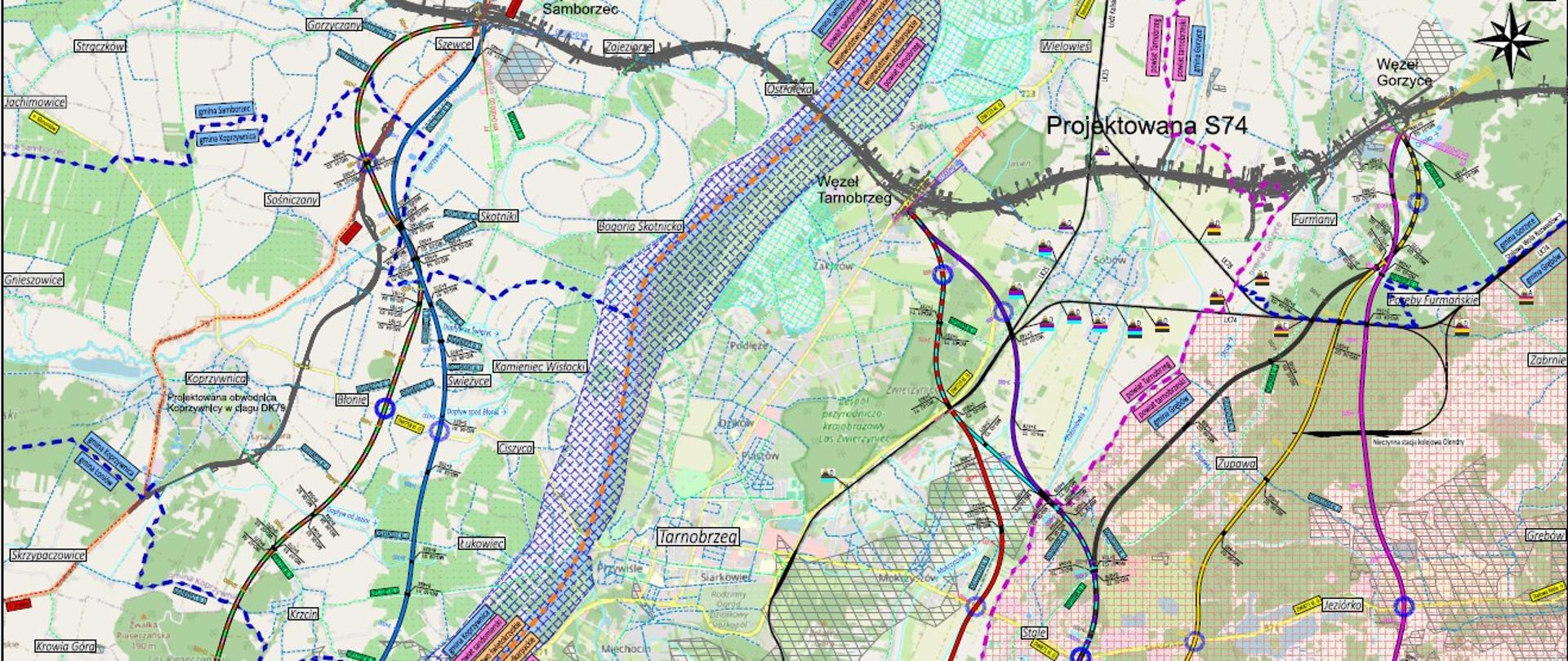 Mapa województwa podkarpackiego w rejonie miasta Tarnobrzeg na której zaznaczono warianty przebiegu nowej drogi krajowej nr 9. warianty zaznaczono różnymi kolorami. 
