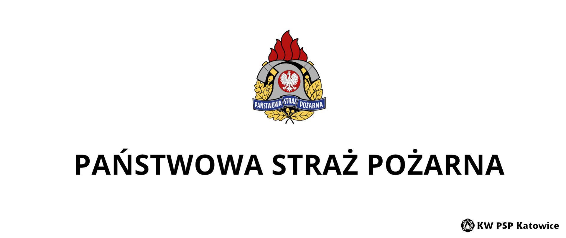 Ilustracja przedstawia na białym tle, na środku kolorowy logotyp Państwowej Straży Pożarnej. Poniżej napis Państwowa Straż Pożarna. W prawym dolnym rogu napis KW PSP Katowice