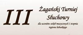 Na szarym tle, u góry napis III Żagański Turniej Słuchowy, w środku symbole: klucz wiolinowy, pięciolina wraz z nutami oraz ucho. 