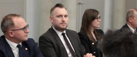 In the photo, Deputy Minister Konrad Wojnarowski sits at the conference table