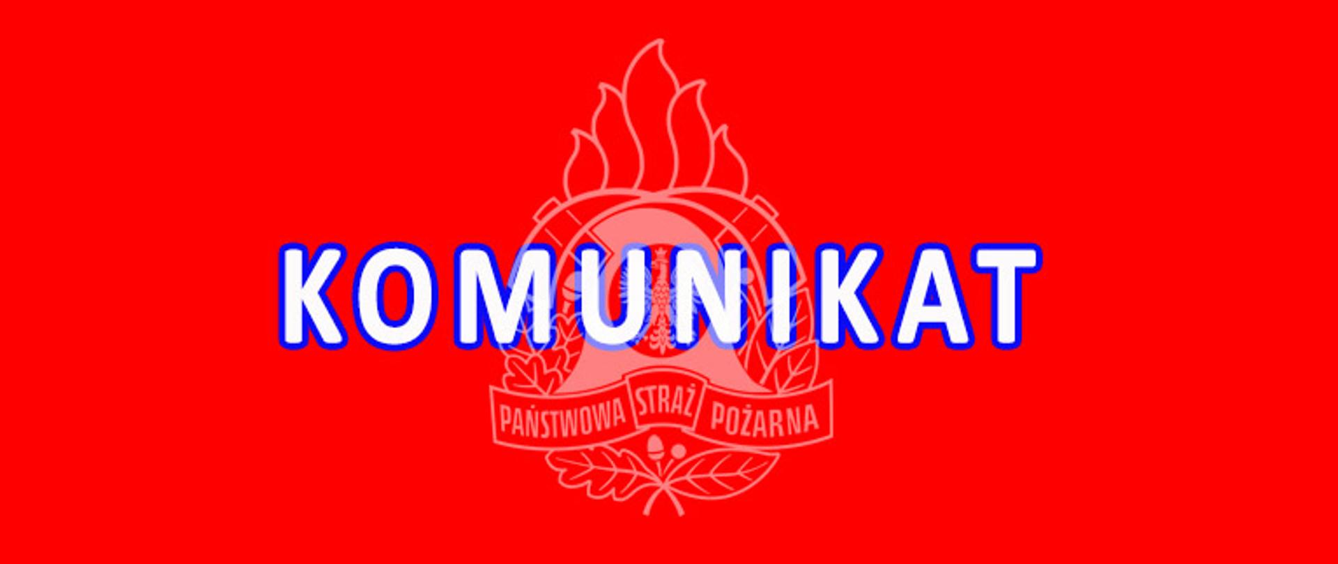 napis komunikat napisany wielką literą barwy białej z niebieską obwódką dookoła, na środku zdjęcia logo straży pożarnej barwy białej