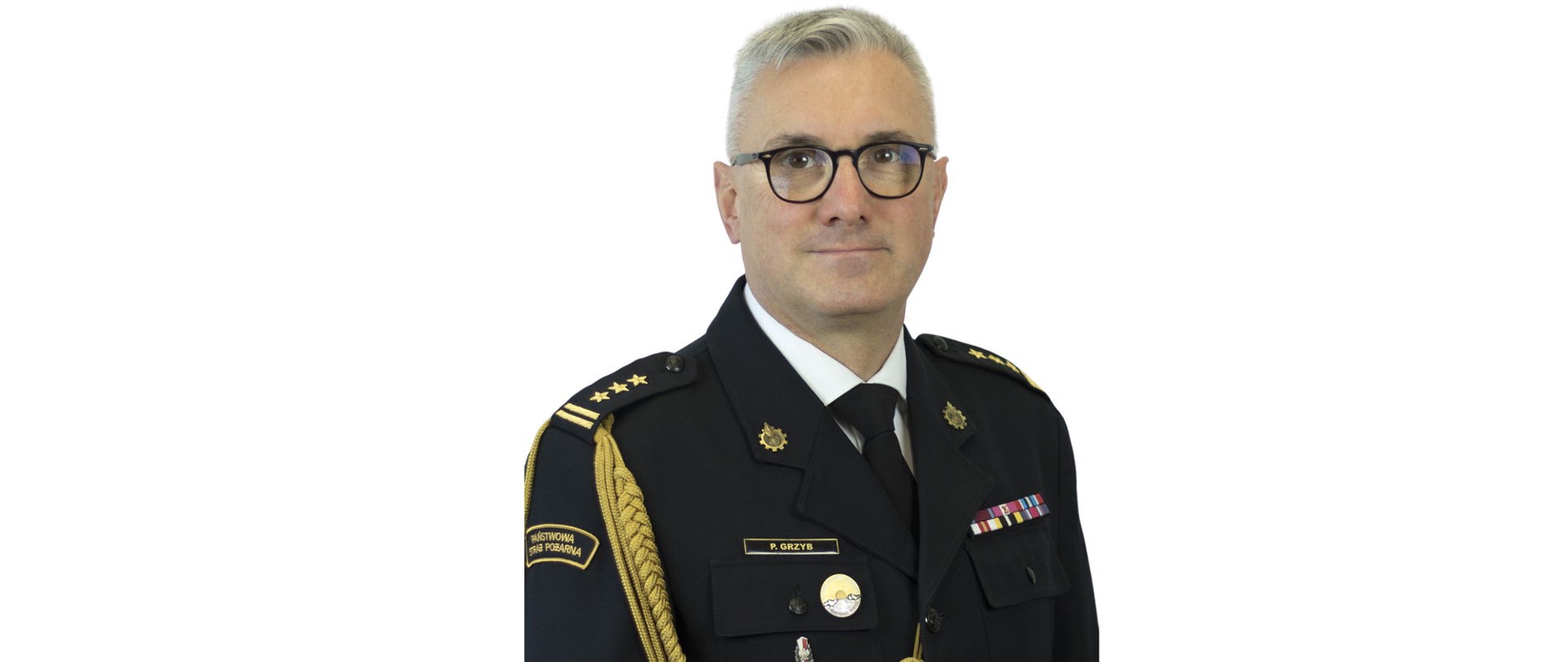 zdjęcie przedstawia zastępcę komendanta wojewódzkiego Państwowej Straży Pożarnej we Wrocławiu starszego brygadiera Piotra Grzyba