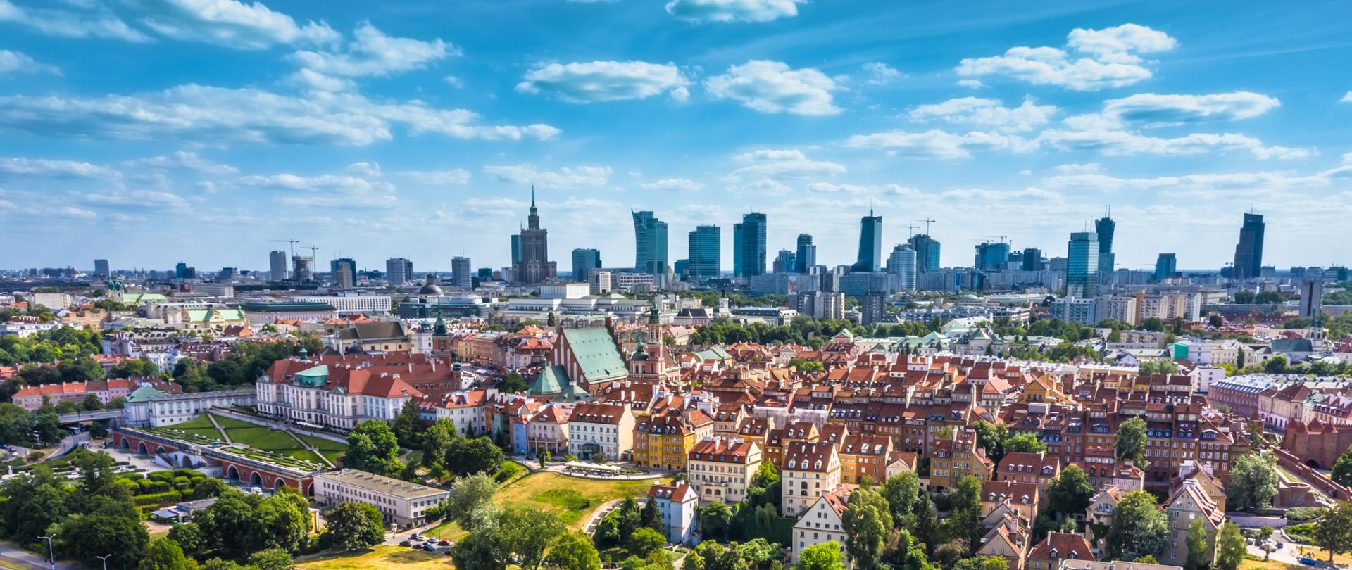 Aerial panorama of Warsaw, Poland over the Vistual river and City center in a distance