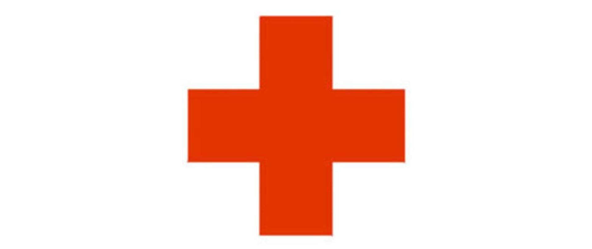 Czerwony krzyż na białym tle