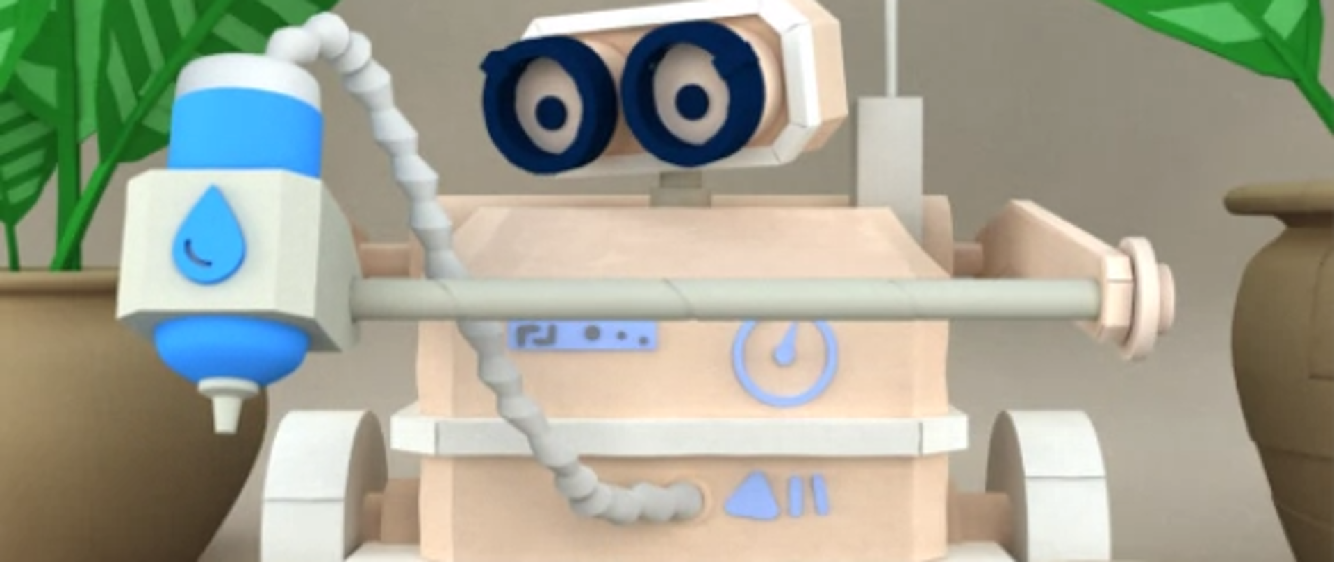 Na zdjęciu widzimy robota, który podlewa sadzonki roślin.