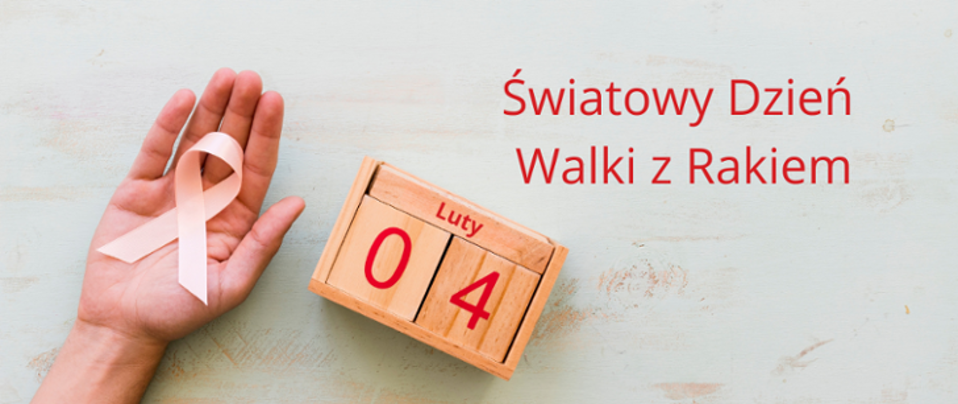 ręka z różową wstążką, drewniany klocek z datą